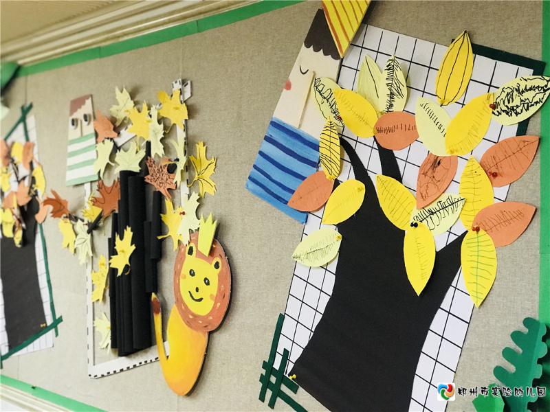 1.小班幼儿用树叶手工作品装饰主题墙.jpg